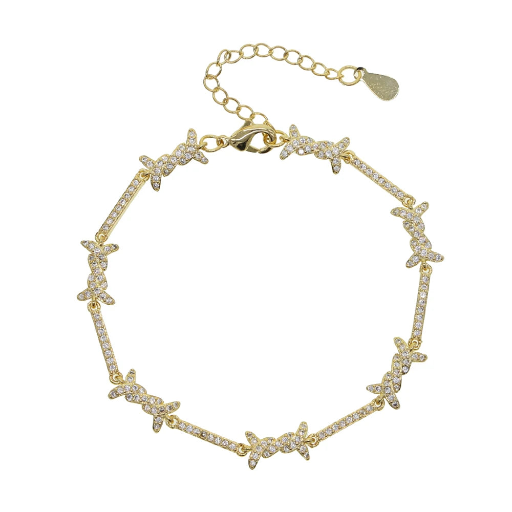 Aureliss Armband Silas in Gold mit Stacheldraht-Design und funkelnden Zirkonia-Steinen