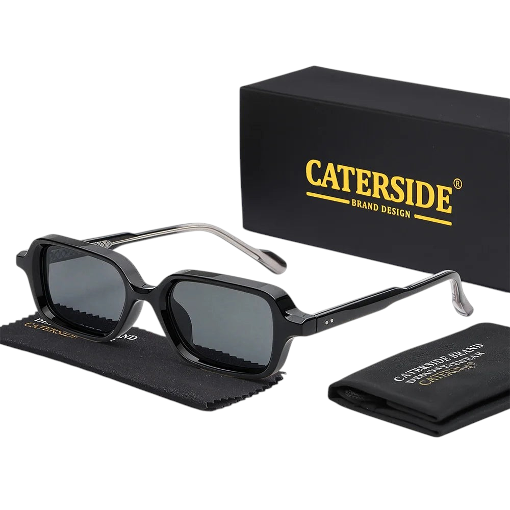 Aureliss Cole rechteckige schwarze Sonnenbrille aus Kunststoff mit UV400-Schutz, präsentiert mit Etui und Putztuch.